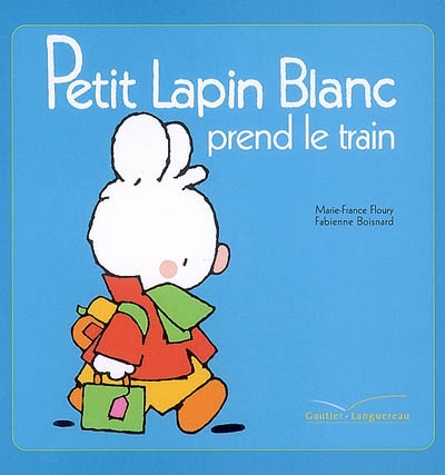 Petit lapin blanc prend le train